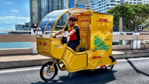 Eco-friendly DHL cargo bike used for sustainable urban deliveries reducing carbon emissions